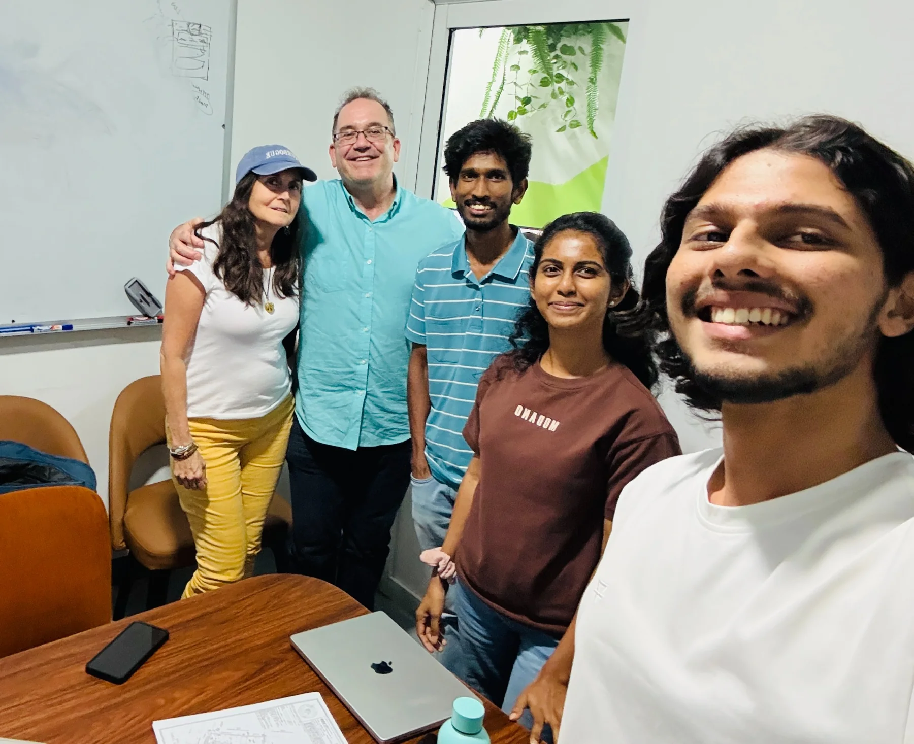 Project team and surveying stakeholders together after a workflow and product discussion